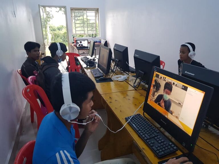 Students learning computer skills